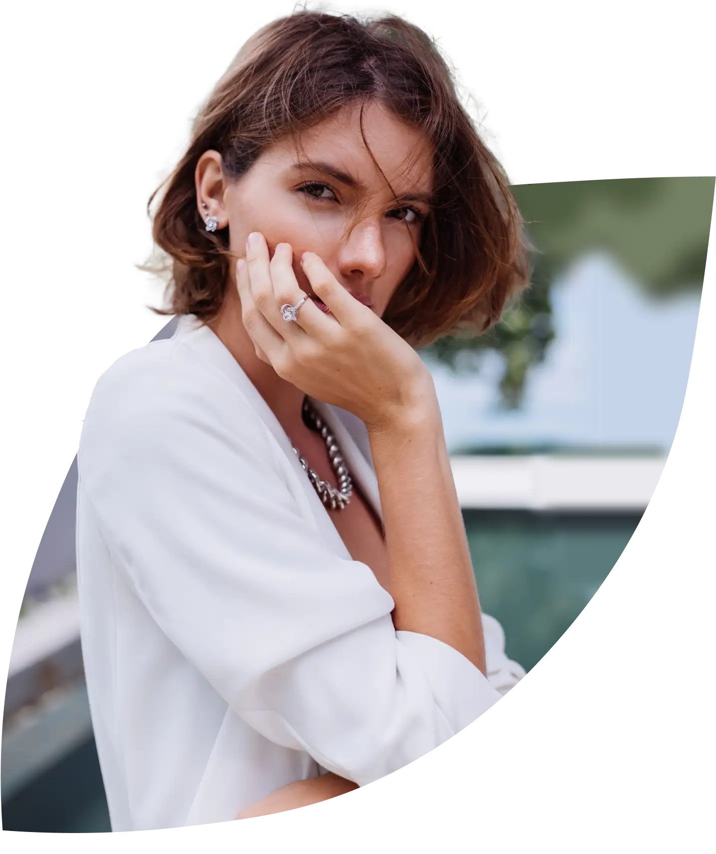 a woman with a necklace on