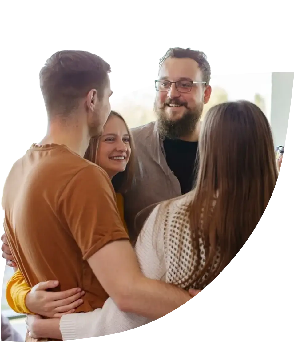 people in a group hug