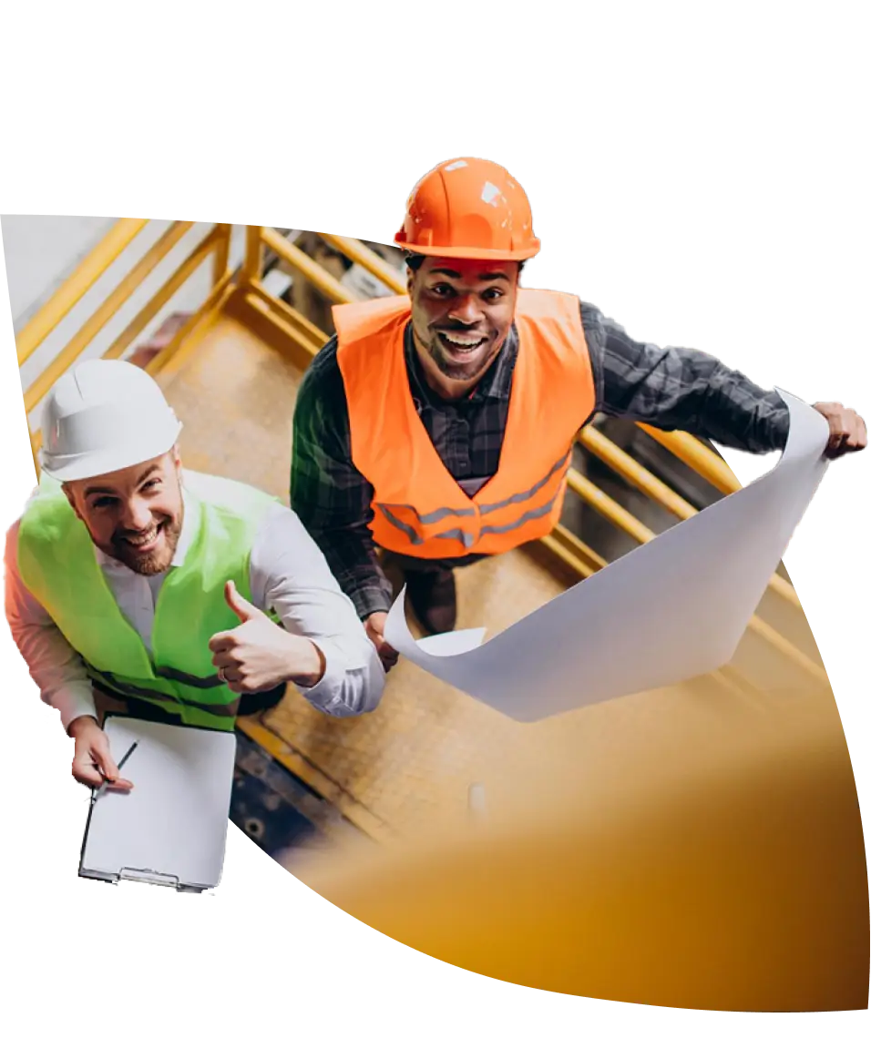 two workers looking up smiling