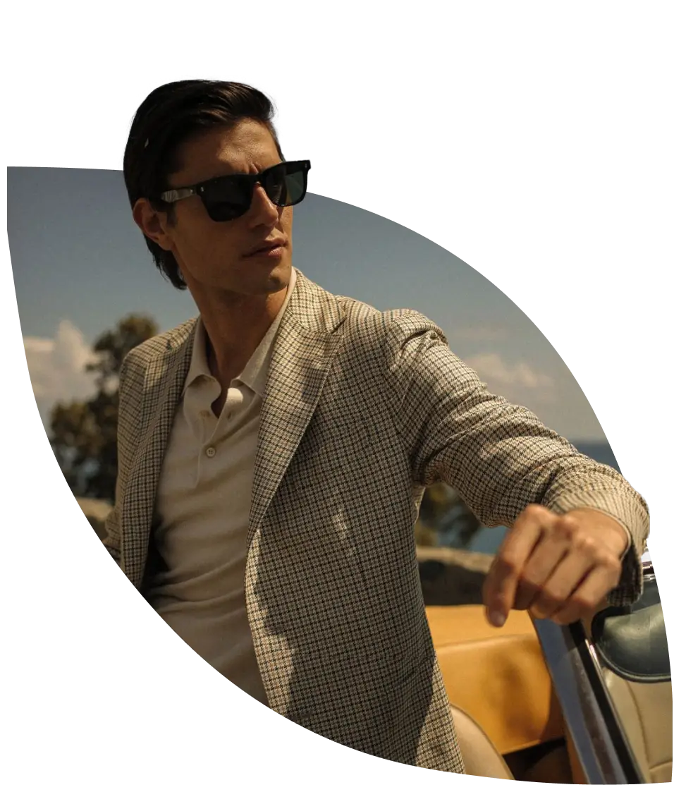 man in a suit with sun glasses