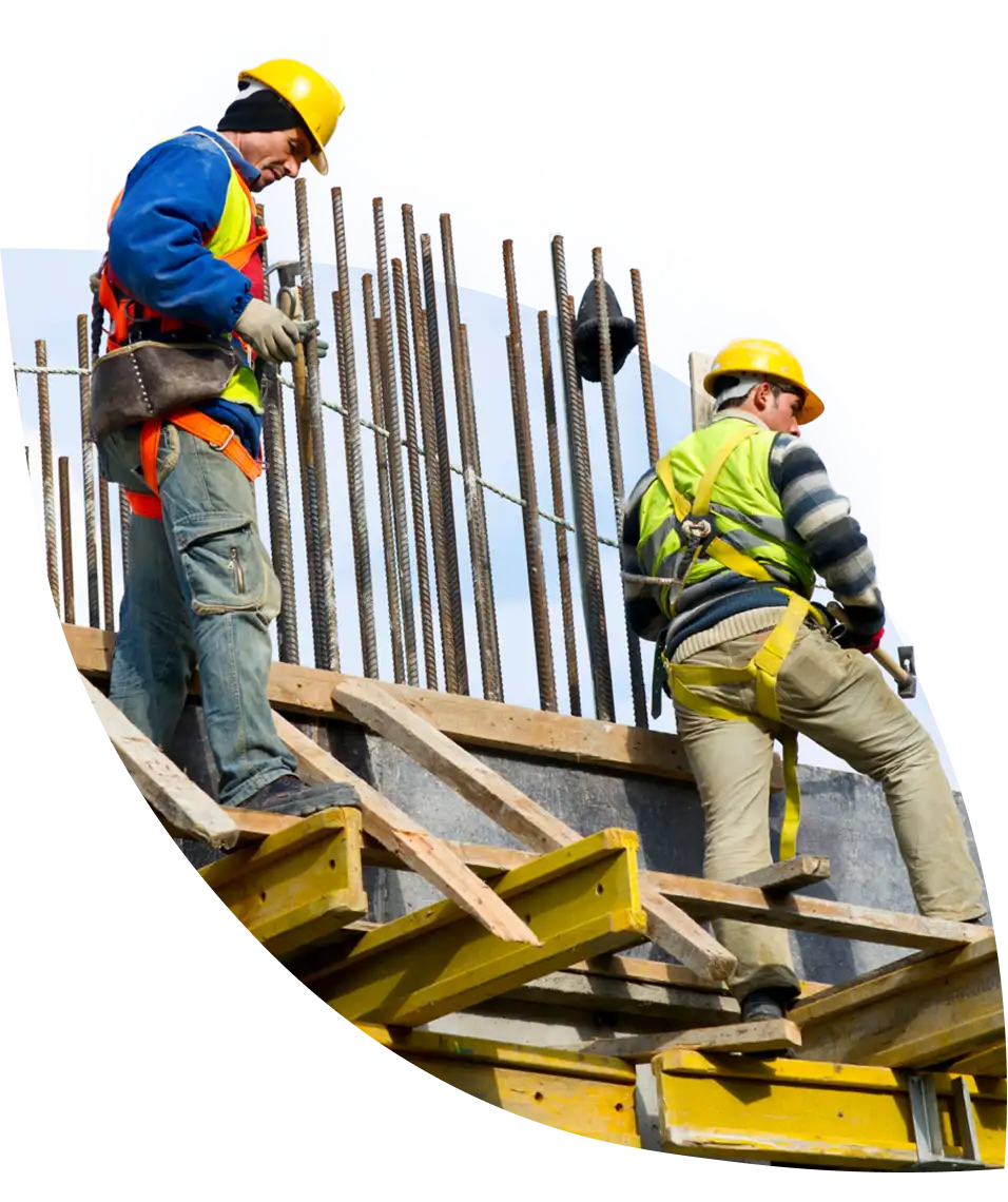 two construction workers building something