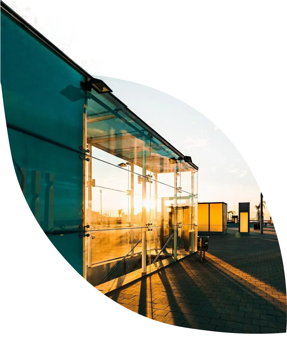 house with glass with the sun shining through